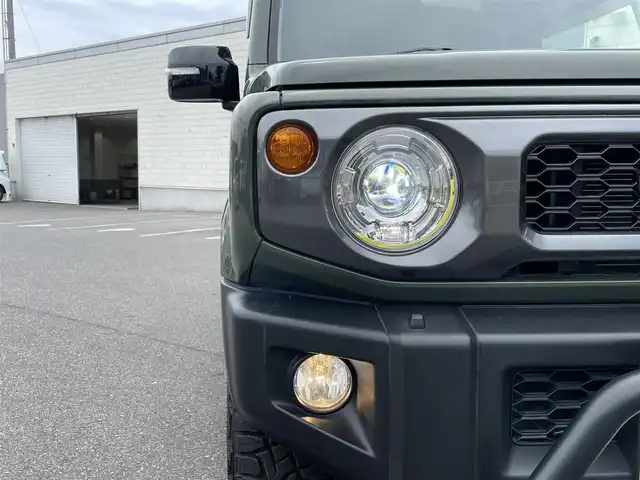 スズキ ジムニー XC 鳥取県 2019(令1)年 3.1万km ジャングルグリーン 4WD/ターボ/ワンオーナー/デュアルセンサーブレーキサポート/純正8型ナビ【CN-RZ843】/・フルセグ/・Bluetooth/・CD/DVD/バックカメラ/スマートキー/プッシュスタート/AAC/クルーズコントロール/ETC/ドライブレコーダー /前席シートヒーター/背面タイヤ＆ハードカバー/社外16AW＆ブロックタイヤ/社外バンパーガード/ABS/レーンキープアシスト/セキュリティアラーム/LEDヘッドライト/オートライト/フォグランプ/W&サイドエアバック