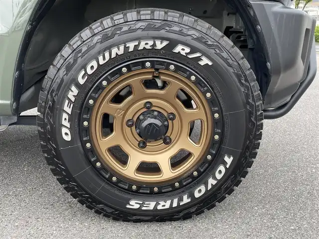スズキ ジムニー XC 鳥取県 2019(令1)年 3.1万km ジャングルグリーン 4WD/ターボ/ワンオーナー/デュアルセンサーブレーキサポート/純正8型ナビ【CN-RZ843】/・フルセグ/・Bluetooth/・CD/DVD/バックカメラ/スマートキー/プッシュスタート/AAC/クルーズコントロール/ETC/ドライブレコーダー /前席シートヒーター/背面タイヤ＆ハードカバー/社外16AW＆ブロックタイヤ/社外バンパーガード/ABS/レーンキープアシスト/セキュリティアラーム/LEDヘッドライト/オートライト/フォグランプ/W&サイドエアバック
