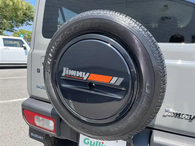 スズキ ジムニー XC 鳥取県 2021(令3)年 3.6万km ミディアムグレー インタークーラーターボ/4WD/carrozzeria8型ナビ【AVIC-CL911】/・フルセグ/・Bluetooth/・HDMI/・CD/DVD/スマートキー/プッシュスタート/ETC/オートエアコン/クルーズコントロール/前後ドライブレコーダー/前席シートヒーター/LEDヘッドライト　/オートライト/W＆サイドエアバック/カーテンエアバック/背面タイヤ/ハードカバー