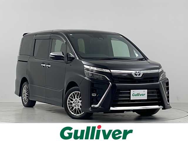 トヨタ ヴォクシー ハイブリッド ZS 煌Ⅱ 大阪府 2021(令3)年 6万km ブラック トヨタセーフティセンス　/　・プリクラッシュブレーキ/　・レーンディパーチャーアラート/　・オートマチックハイビーム/社外メモリナビ　/両側パワースライドドア/クルーズコントロール　/LEDオートライト　/フォグランプ　/シートヒーター　/純正16インチアルミホイール　/クリアランスソナー/アイドリングストップ/スマートキー　/ビルトインETC