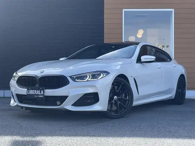ＢＭＷ ＢＭＷ ８４０ｄ xDrive グランC エクスクルーシブ Mスポーツ 栃木県 2022(令4)年 3.8万km ミネラルホワイト 赤黒コンビレザー/スライディングサンルーフ/ソフトクローズドア/ワイヤレスチャージ/ジェスチャーコントロール/コンフォートアクセス/インテリジェントセーフティ/パワートランクリッド/アンビエントライト/ACC/PDC/レーンキープアシスト/ブラインドスポット/Harman/Kardon/全席シートヒーター/前席ベンチレーター/パワーシート/ナビ/フルセグTV/全方位カメラ/ミラーETC/BMWレーザーLEDライト/オートハイビーム