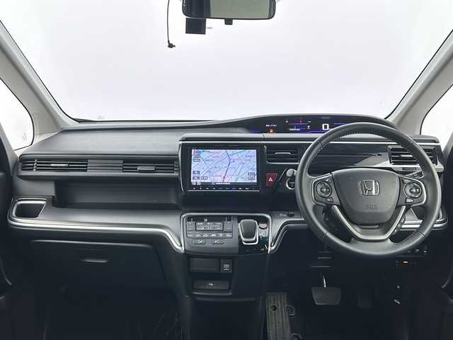ホンダ ステップワゴン スパーダ ハイブリッド G EX ホンダセンシング 大阪府 2017(平29)年 5.7万km プレミアムスパークルブラックパール 純正9インチインターナビ/・フルセグTV/・Bluetooth/・CD/DVD/・FM/AM/・HDMI/社外後席フリップダウンモニター/ホンダセンシング/衝突軽減ブレーキ/誤発進抑制装置/後方誤発進抑制機能/路外逸脱抑制機能/アダプティブクルーズコントロール/車線維持支援システム/先行車発進お知らせ機能/オートハイビーム/パーキングセンサー/パーキングアシスト/両側パワースライドドア/ハーフレザーシート/シートヒーター/シートバックテーブル/ロールサンシェード/LEDヘッドライト/スマートキー