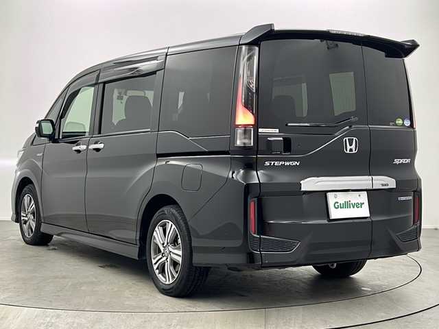 ホンダ ステップワゴン スパーダ ハイブリッド G EX ホンダセンシング 大阪府 2017(平29)年 5.7万km プレミアムスパークルブラックパール 純正9インチインターナビ/・フルセグTV/・Bluetooth/・CD/DVD/・FM/AM/・HDMI/社外後席フリップダウンモニター/ホンダセンシング/衝突軽減ブレーキ/誤発進抑制装置/後方誤発進抑制機能/路外逸脱抑制機能/アダプティブクルーズコントロール/車線維持支援システム/先行車発進お知らせ機能/オートハイビーム/パーキングセンサー/パーキングアシスト/両側パワースライドドア/ハーフレザーシート/シートヒーター/シートバックテーブル/ロールサンシェード/LEDヘッドライト/スマートキー
