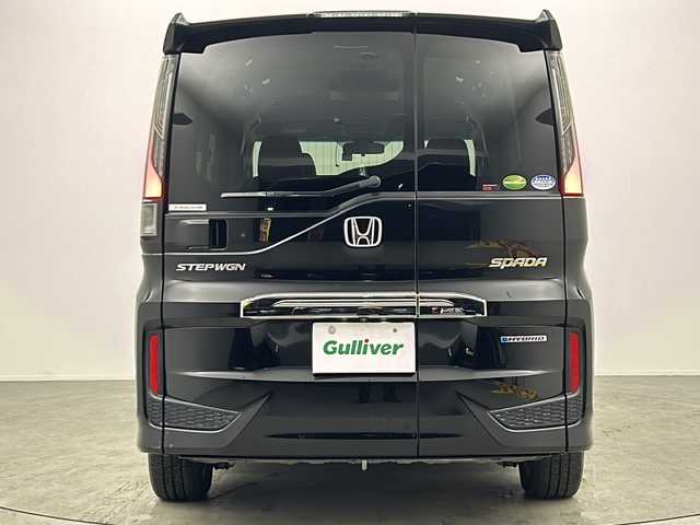 ホンダ ステップワゴン スパーダ ハイブリッド G EX ホンダセンシング 大阪府 2017(平29)年 5.7万km プレミアムスパークルブラックパール 純正9インチインターナビ/・フルセグTV/・Bluetooth/・CD/DVD/・FM/AM/・HDMI/社外後席フリップダウンモニター/ホンダセンシング/衝突軽減ブレーキ/誤発進抑制装置/後方誤発進抑制機能/路外逸脱抑制機能/アダプティブクルーズコントロール/車線維持支援システム/先行車発進お知らせ機能/オートハイビーム/パーキングセンサー/パーキングアシスト/両側パワースライドドア/ハーフレザーシート/シートヒーター/シートバックテーブル/ロールサンシェード/LEDヘッドライト/スマートキー