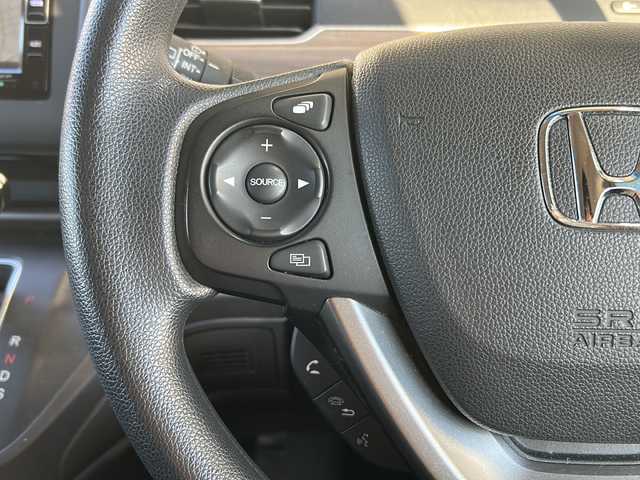 ホンダ フリード G ホンダセンシング 静岡県 2021(令3)年 2.3万km シルバー 純正SDナビ（AM.FM.CD.DVD.ワンセグTV.Bluetooth）/両側パワースライドドア/バックカメラ/アイドリングストップ/レーダークルーズコントロール/プッシュスタート/ドライブレコーダー/ETC/純正ホイールキャップ/レーンキープアシスト/スマートキー/スペアキー/ステアリングリモコン　/衝突軽減システム/横滑り防止装置/オートライト/盗難防止装置/純正フロアマット/ウォークスルー