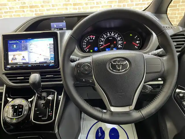 トヨタ ヴォクシー ZS 煌Ⅲ 岩手県 2021(令3)年 7.2万km ブラック 4WD/社外9インチナビ/トヨタセーフティセンス/衝突軽減ブレーキ/クルーズコントロール/レーンキープアシスト/両側パワースライドドア/バックカメラ/社外フリップダウンモニター/ハーフレザーシート/ドライブレコダー/ワイパーデアイサー/ビルトインETC/アイドリングストップ/電動格納ドアミラー/ステアリングリモコン/純正16インチアルミホイール/寒冷地仕様/マニュアルモード付オートマチックトランスミッション/LEDヘッドライト/オートライト