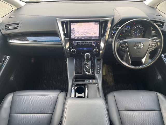 トヨタ ヴェルファイア ハイブリット ZR 山口県 2019(令1)年 2.6万km ホワイトパールクリスタルシャイン ＡＬＰＩＮＥ１１インチナビ　/AM/FM/CD/DVD/Bluetooth/フルセグTV/ＡＬＰＩＮＥ１２．８型フリップダウンモニター　/全方位カメラ　/両側パワースライドドア　/電動リアゲート　/黒革シート/シートベンチレーション/レーダークルーズコントロール　/前席、2列目パワーシート/三眼ＬＥＤヘッドライト　/クリアランスソナー/レーンキープアシスト/衝突被害軽減ブレーキ/純正１８インチアルミホイール/ＥＴＣ　/ドライブレコーダー