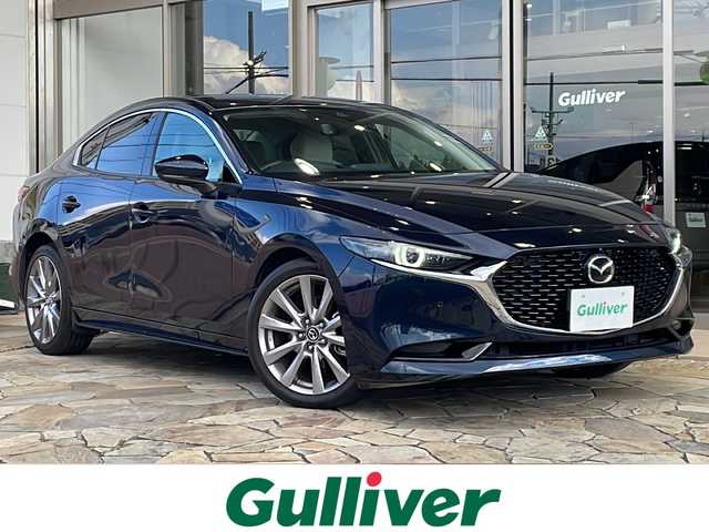 マツダ マツダ３セダン XD Lパッケージ 静岡県 2019(令1)年 4.3万km ディープクリスタルブルーマイカ ベージュ革シート/BOSEサウンド/アラウンドビューモニター/純正ナビ/フルセグTV/純正アルミホイール/ETC/LEDヘッドライト/ドライブレコーダー/衝突軽減ブレーキ/アダプティブクルーズコントロール/レーンキープアシスト/ブラインドスポットアシスト/誤発進抑制機能/パワーシート/シートヒーター/ステアリングヒーター/クリアランスソナー/スマートキー/プッシュスタート/横滑り防止装置
