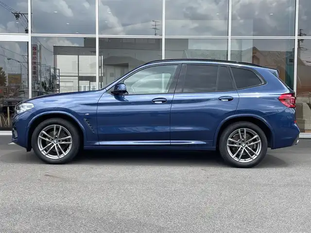 ＢＭＷ Ｘ３ xDrive20d Mスポーツ 岐阜県 2020(令2)年 3.4万km ファイトニックブルー ドライビング・アシスト・プラス/ アクティブ・クルーズ・コントロール/ ステアリング&レーンコントロールアシスト/ レーン・ディパーチャーウォーニング/ レーンチェンジウォーニング/ アクティブ・サイドコリジョンプロテクション/ 前車接近警告機能/ 衝突回避・被害軽減ブレーキ/ 事故回避アシスト/ 後車衝突警告機能/ クロス・トラフィック・ウォーニング（フロント&リヤ）/パーキング・アシスト・プラス/ パークディスタンスコントロール/ パーキング・アシスト（並列・縦列）/ トップ・ビュー/ サイド・ビュー・カメラ / リヤ・ビュー・カメラ/ヘッドアップディスプレイ/アダプティブLEDヘッドライト/ LEDハイ／ロービーム/ LEDフロントターンインジケータ/ コーナリングライト/ ハイビームアシスタント/BMWライブ・コックピット/ 12.3インチ マルチディスプレイメーターパネル/ 10.25インチワイドコントロールディスプレイ/ HDDナビゲーション・システム/ 電動フロント・シート/ フロント・シート・ヒーティング/スクリーンミラーリング/パドルシフト/ミラー一体ＥＴＣ/パワーバックドア