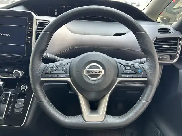 日産 セレナ ハイウェイスター V 兵庫県 2022(令4)年 3万km ダークメタルグレー 純正１０インチナビ(CD/DVD/BT/TV)/フルセグTV/アラウンドビューモニター/プロパイロット/フリップダウンモニター/デジタルインナーミラー/ステアリングリモコン/クルーズコントロール（追従あり）/レーンキープアシスト/オートライト/両側パワースライドドア/ビルドインETC/衝突被害軽減システム/プッシュスタート/リアサンシェード/純正フロアマット/ドアバイザー/LEDヘッドライト/コーナーセンサー/純正16インチアルミホイール/スペアキー1本