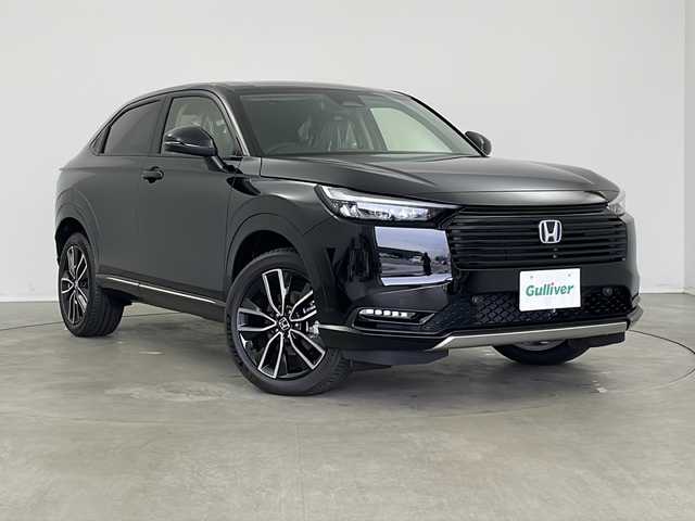 ホンダ ヴェゼル ハイブリッド e:HEV Z 新潟県 2025(令7)年 0.1万km未満 クリスタルブラックパール 純正メモリ９インチナビ/フルセグTV/バックカメラ/Bluetooth/USB/ワイヤレス充電/ETC2.0ビルトイン/ハーフレザーシート/前席シートヒーター/ステアリングヒーター/レザーステアリング/パドルシフト/ブラインドスポットモニター/ホンダセンシング/アダプティブクルーズコントロール/保証書/取扱説明書