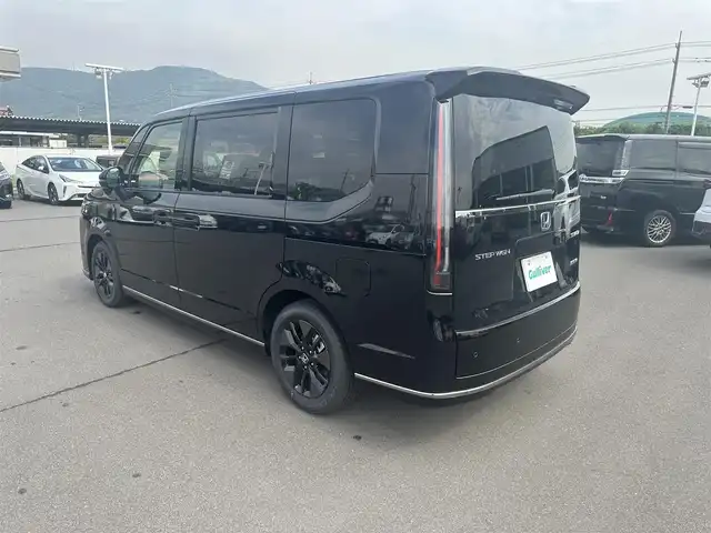 ホンダ ステップワゴン スパーダ eHEV 岡山県 2025(令7)年 0.1万km未満 クリスタルブラックパール 登録時走行距離 5km/登録済未使用車/純正11.4インチナビ/フルセグTV/（AM.FM.TV.CD.DVD.BT）/両側パワースライドドア/フロントセンサーカメラ/バックビューモニター/シートヒーター/レーダークルーズコントロール/クリアランスソナー/衝突軽減ブレーキ/オットマン/電動リアゲート/レーンキープアシスト/フルフラットシート/カーテンエアバック/16インチ純正AW