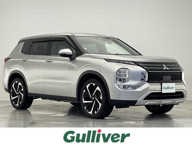 三菱 アウトランダー ＰＨＥＶ G 滋賀県 2023(令5)年 2万km スターリングシルバーM 禁煙車/純正9インチナビ/フルセグ.Bluetooth.Applecarplay/全方位カメラ/衝突軽減ブレーキ/マイパイロット/電動リアゲート/前席シートヒーター/合皮シート/前席パワーシート/ETC2.0/ステアリングヒーター/前後ドライブレコーダー/ブラインドスポットモニター/クリアランスソナー/置くだけ充電/オートハイビーム/オートライト/LEDヘッドライト/オートブレーキホールド/電子パーキング/パドルシフト