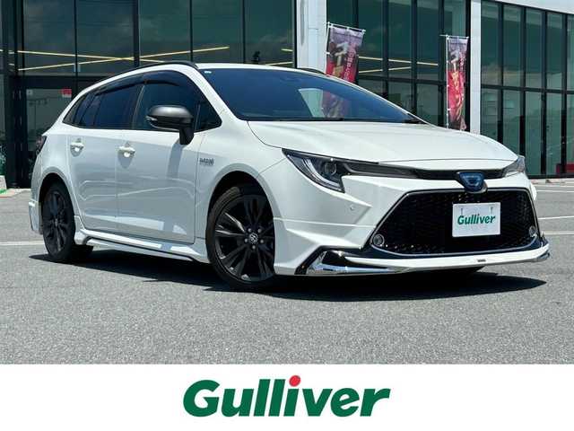 トヨタ カローラツーリング ハイブリッド ダブルバイビー 奈良県 2020(令2)年 4.8万km ホワイトパールクリスタルシャイン モデリスタエアロ/電動パーキングブレーキ　/ブレーキホールド　/ブラインドスポットモニター　/ヘッドアップディスプレイ　/デジタルインナーミラー　/前後ドライブレコーダー　/ＥＴＣ２．０　/ステアリングヒーター/純正１７インチアルミ/ルーフレール/　