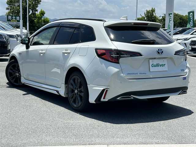 トヨタ カローラツーリング ハイブリッド ダブルバイビー 奈良県 2020(令2)年 4.8万km ホワイトパールクリスタルシャイン モデリスタエアロ/電動パーキングブレーキ　/ブレーキホールド　/ブラインドスポットモニター　/ヘッドアップディスプレイ　/デジタルインナーミラー　/前後ドライブレコーダー　/ＥＴＣ２．０　/ステアリングヒーター/純正１７インチアルミ/ルーフレール/　