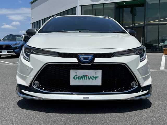 トヨタ カローラツーリング ハイブリッド ダブルバイビー 奈良県 2020(令2)年 4.8万km ホワイトパールクリスタルシャイン モデリスタエアロ/電動パーキングブレーキ　/ブレーキホールド　/ブラインドスポットモニター　/ヘッドアップディスプレイ　/デジタルインナーミラー　/前後ドライブレコーダー　/ＥＴＣ２．０　/ステアリングヒーター/純正１７インチアルミ/ルーフレール/　