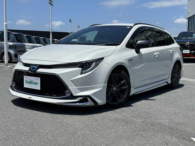 トヨタ カローラツーリング ハイブリッド ダブルバイビー 奈良県 2020(令2)年 4.8万km ホワイトパールクリスタルシャイン モデリスタエアロ/電動パーキングブレーキ　/ブレーキホールド　/ブラインドスポットモニター　/ヘッドアップディスプレイ　/デジタルインナーミラー　/前後ドライブレコーダー　/ＥＴＣ２．０　/ステアリングヒーター/純正１７インチアルミ/ルーフレール/　