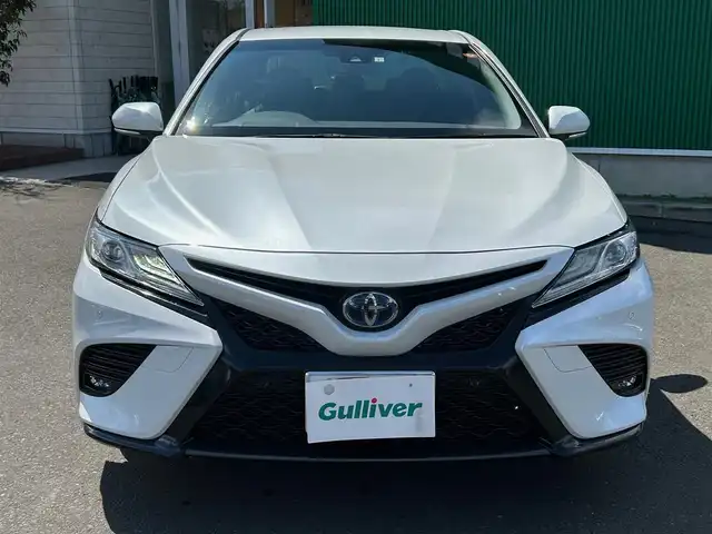 トヨタ カムリ WS ブラックエディション 宮城県 2021(令3)年 5万km プラチナホワイトパールマイカ セーフティセンス/・プリクラッシュセーフティ/・レーンディパーチャーアラート/・オートマチックハイビーム/・レーダークルーズコントロール/ブラインドスポットモニター/リアクロストラフィックオートブレーキ/インテリジェントクリアランスソナー/8インチディスプレイオーディオ/・ナビ機能付/・Bluetooth/・フルセグTV/バックカメラ/ビルトインETC2.0/ドライブレコーダー/本革シート/シートヒーター/パワーシート/革巻きステアリング/ステアリングスイッチ/パドルシフト/電動パーキングブレーキ/ブレーキホールド/LEDヘッドランプ/フォグランプ/オートライト/スマートキー＆プッシュスタート/電動格納ミラー/純正18インチAW/純正フロアマット/純正ドアバイザー/W/サイド/カーテンエアバッグ