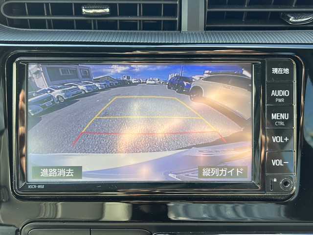 トヨタ アクア クロスオーバー 沖縄県 2019(令1)年 2万km ホワイトパールクリスタルシャイン 純正ナビ　/（ＡＭ／ＦＭ／ＣＤ／Ｂ）　/バックモニター　/衝突軽減　/レーンキープアシスト/コーナーセンサー　/アイドリングストップ　/ハーフレザー　/シートヒーター　/ＥＴＣ　/純正１６ＡＷ　/ベンチシート/スマートキー/オートライト/横滑り防止