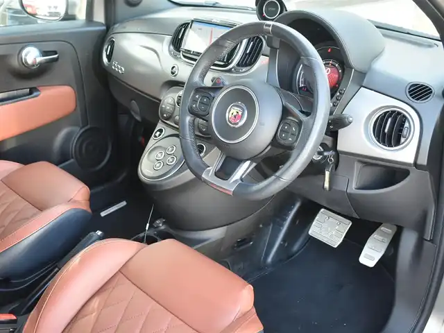アバルト ５９５ ツーリズモ 神奈川県 2022(令4)年 1.5万km グレー ワンオーナー/カラー708/茶革シート/社外メモリナビAVIC-RZ711/フルセグテレビ/DVD/CD/Bluetoothオーディオ/エンブレム入り前後ドラレコ/ETC/純正17インチアルミホイール/純正フロアマット/リモコンキー/純正フロアマット/SPORTモードメーター/オートエアコン/コーナーセンサーリヤ/保証書/取扱説明書