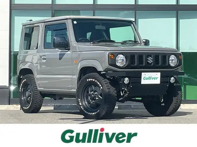 スズキ ジムニー XL 和歌山県 2022(令4)年 1.2万km ミディアムグレー 5速MT/４WD/社外オーディオ/社外フロアマット/オートライト/ハロゲンヘッドライト/背面タイヤ