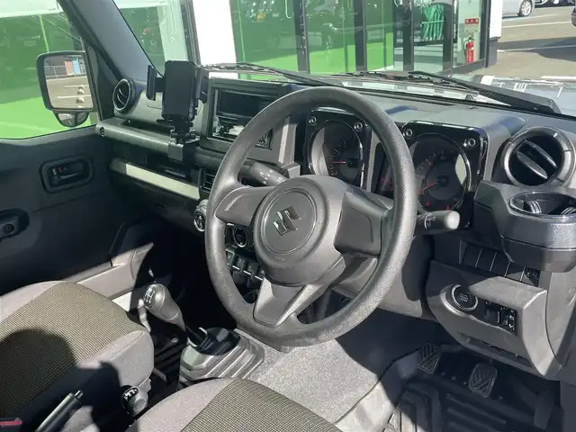 スズキ ジムニー XL 和歌山県 2022(令4)年 1.2万km ミディアムグレー 5速MT/４WD/社外オーディオ/社外フロアマット/オートライト/ハロゲンヘッドライト/背面タイヤ