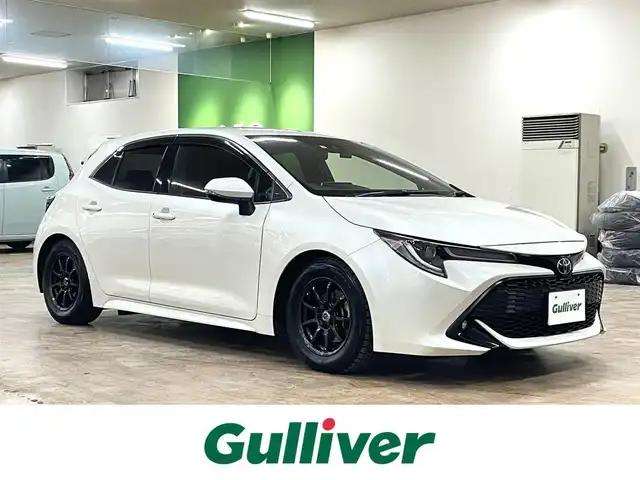 トヨタ カローラ スポーツ G Z 道央・札幌 2019(令1)年 8.6万km ホワイトパールクリスタルシャイン ワンオーナー/4WD/寒冷地仕様/ブリッツ車高調/リアスポイラー/衝突軽減ブレーキ/レーンキープアシスト/横滑り防止/純正ナビ/フルセグTV/Bluetooth/CD/DVD/バックカメラ/フロントワイパーデアイサー/レーダークルーズコントロール/オートマチックハイビーム/ステアリングリモコン/ステアリングヒーター/ミラーヒーター/LEDヘッドライト/LEDフォグランプ/ETC/ドライブレコーダー（前方）/社外レーダー（ASSURA）/WORK18インチAW付サマータイヤ積込み/　255/35/18　2019年製（タイヤ交換要）/スマートキー×2/保証書/取扱説明書