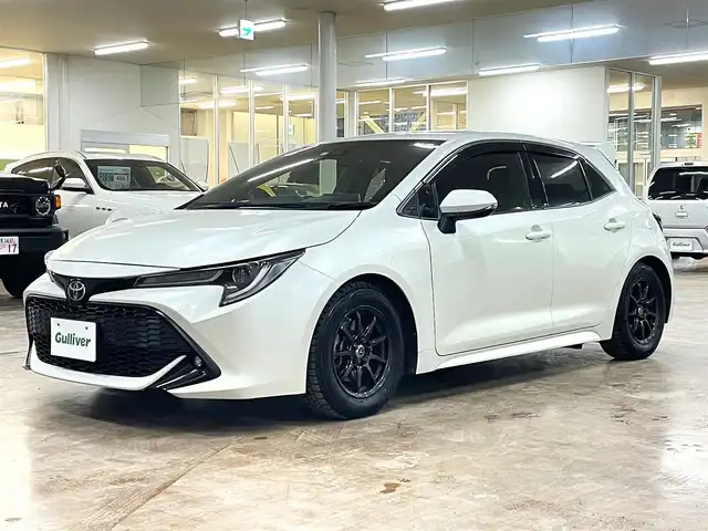 トヨタ カローラ スポーツ G Z 道央・札幌 2019(令1)年 8.6万km ホワイトパールクリスタルシャイン ワンオーナー/4WD/寒冷地仕様/ブリッツ車高調/リアスポイラー/衝突軽減ブレーキ/レーンキープアシスト/横滑り防止/純正ナビ/フルセグTV/Bluetooth/CD/DVD/バックカメラ/フロントワイパーデアイサー/レーダークルーズコントロール/オートマチックハイビーム/ステアリングリモコン/ステアリングヒーター/ミラーヒーター/LEDヘッドライト/LEDフォグランプ/ETC/ドライブレコーダー（前方）/社外レーダー（ASSURA）/WORK18インチAW付サマータイヤ積込み/　255/35/18　2019年製（タイヤ交換要）/スマートキー×2/保証書/取扱説明書