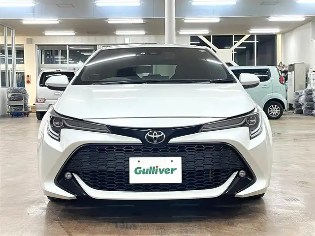 トヨタ カローラ スポーツ G Z 道央・札幌 2019(令1)年 8.6万km ホワイトパールクリスタルシャイン ワンオーナー/4WD/寒冷地仕様/ブリッツ車高調/リアスポイラー/衝突軽減ブレーキ/レーンキープアシスト/横滑り防止/純正ナビ/フルセグTV/Bluetooth/CD/DVD/バックカメラ/フロントワイパーデアイサー/レーダークルーズコントロール/オートマチックハイビーム/ステアリングリモコン/ステアリングヒーター/ミラーヒーター/LEDヘッドライト/LEDフォグランプ/ETC/ドライブレコーダー（前方）/社外レーダー（ASSURA）/WORK18インチAW付サマータイヤ積込み/　255/35/18　2019年製（タイヤ交換要）/スマートキー×2/保証書/取扱説明書
