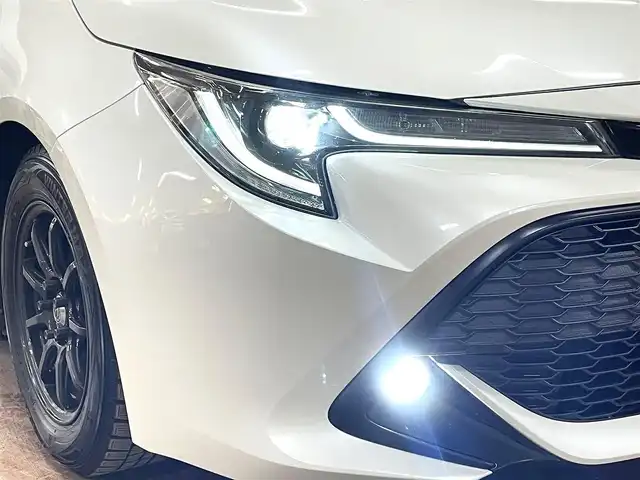 トヨタ カローラ スポーツ G Z 道央・札幌 2019(令1)年 8.6万km ホワイトパールクリスタルシャイン ワンオーナー/4WD/寒冷地仕様/ブリッツ車高調/リアスポイラー/衝突軽減ブレーキ/レーンキープアシスト/横滑り防止/純正ナビ/フルセグTV/Bluetooth/CD/DVD/バックカメラ/フロントワイパーデアイサー/レーダークルーズコントロール/オートマチックハイビーム/ステアリングリモコン/ステアリングヒーター/ミラーヒーター/LEDヘッドライト/LEDフォグランプ/ETC/ドライブレコーダー（前方）/社外レーダー（ASSURA）/WORK18インチAW付サマータイヤ積込み/　255/35/18　2019年製（タイヤ交換要）/スマートキー×2/保証書/取扱説明書
