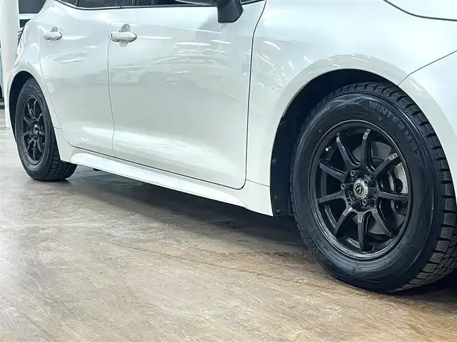 トヨタ カローラ スポーツ G Z 道央・札幌 2019(令1)年 8.6万km ホワイトパールクリスタルシャイン ワンオーナー/4WD/寒冷地仕様/ブリッツ車高調/リアスポイラー/衝突軽減ブレーキ/レーンキープアシスト/横滑り防止/純正ナビ/フルセグTV/Bluetooth/CD/DVD/バックカメラ/フロントワイパーデアイサー/レーダークルーズコントロール/オートマチックハイビーム/ステアリングリモコン/ステアリングヒーター/ミラーヒーター/LEDヘッドライト/LEDフォグランプ/ETC/ドライブレコーダー（前方）/社外レーダー（ASSURA）/WORK18インチAW付サマータイヤ積込み/　255/35/18　2019年製（タイヤ交換要）/スマートキー×2/保証書/取扱説明書