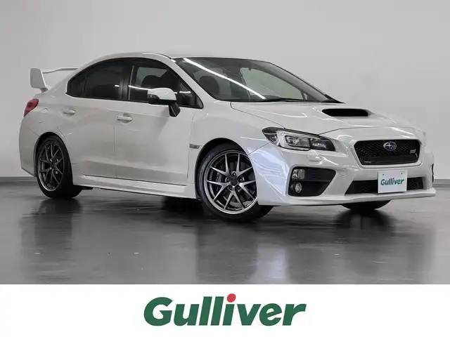 スバル ＷＲＸ ＳＴＩ STI タイプS 三重県 2014(平26)年 2.4万km クリスタルホワイトP プレミアムガソリン・ターボ/AWD/6F/【OP】純正 7インチナビ CN-LR700D/（FM/AM/CD/DVD/TV/iPod/USB/SD/MEMORY MUSIC/HDMI/VTR/ハンズフリー通話*）/バックカメラ/【OP】bremboブレーキキット フロント6pot/リヤ4pot者ブロックブレーキキャリパー/大型リヤスポイラー（タイプS標準）/HKS車高調『HIPERMAX S』＆2本出しマフラー『HI-POWER SPEC L II』/純正サス・マフラー車載/ETC/安全/・ABS/・トラクションコントロール/・サイド＆カーテンエアバッグシステム/装備/・ハーフレザーシート/・オートワイパー/・オートライト/・LEDヘッドライト/・左右独立オートエアコン/・SI-DRIVE/・パワーウインドウ/・パワーステアリング/・電動格納ドアミラー/・RAYS製 18インチ鍛造アルミホイール（18×8.5＋55）/・プッシュスタート/・スマートキーx2/・EJ20型 水平対向4気筒・DOHC16バルブターボエンジン/（カタログ値308HP/6400rpm、43.0kg・m/4400rpm）/・保/取/など/*：Bluetoothオーディオは再生不可