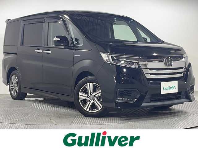 ホンダ ステップワゴン スパーダ eHEV G ホンダS 広島県 2020(令2)年 3.9万km プレミアムスパークルブラックパール 社外ナビ(CN-RA06D)/・フルセグTV/・CD/DVD/・Bluetooth/・SD音楽録音/衝突軽減ブレーキ〈CMBS〉/誤発進抑制機能/歩行者事故低減ステアリング/路外逸脱抑制機能/渋滞追従機能付＊ACC〈アダプティブ・クルーズ・コントロール〉/LKAS〈車線維持支援システム〉/先行車発進お知らせ機能/標識認識機能/バックカメラ/両側パワースライドドア/革巻きステアリング/ステアリングスイッチ/LEDヘッドライト/オートライト/LEDフォグランプ/コンフォートビューパッケージ/デュアルエアコン＋リアクーラー/電子制御パーキングブレーキ/オートブレーキホールド/コンビニフック付シートバックテーブル/ロールサンシェイド/ビルトインETC/純正16インチアルミホイール(205/60/R16)/Wエアバック