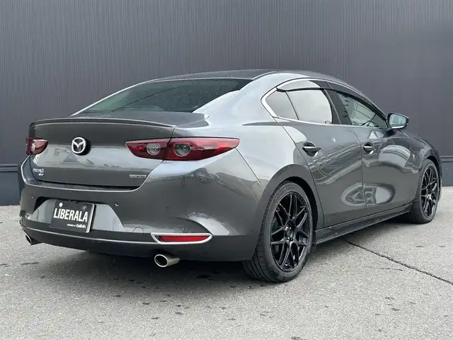 マツダ マツダ３セダン 15S ツーリング 道東・釧路十勝 2020(令2)年 3万km マシーングレープレミアムM ・ワンオーナー/・４WD/・寒冷地仕様/・純正SDナビ/・CD/DVD/BT/USB/HDMI/フルセグ/・バックカメラ/・ヘッドアップディスプレイ/・i-ACTIVSENSE/・アドバンスト・スマート・シティ・ブレーキ・サポート/・レーンキープアシスト/・レーダークルーズコントロール/・クリアランスソナー/・横滑り防止装置/・ブラインドスポットモニタリング/・ハイビーム・コントロール・システム/・アダプティブ・フロントライティング・システム/・LEDヘッドライト/・社外18インチAW/・純正フロアマット/・純正エンジンスターター/・プッシュスタート/・スマートキー/・取扱説明書/・保証書