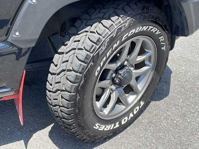 スズキ ジムニー XC 長野県 2022(令4)年 2.4万km ブルーイッシュブラックパール3 ４WD/レーダーブレーキ /カロッツェリア8インチナビフルセグTV/ETC/純正16インチアルミ/オープンカントリーオフロードタイヤ/ドラレコ内蔵デジタルインナーミラー/純正ゴムマット/保証書・取説