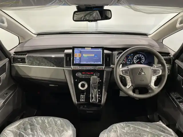 三菱 デリカＤ：５ ブラックエディション 愛知県 2025(令7)年 0.1千km アメジストブラック 登録済未使用車/電動サイドステップ/本革シート/純正１１インチナビ/フリップダウンモニター/両側パワースライドドア/パワーバックドア/レーダークルーズコントロール/衝突軽減ブレーキ/車線逸脱警報/ブラインドスポットモニター/電動パーキングブレーキ/ブレーキホールド/パドルシフト/ハンドルヒーター/シートヒーター/ＬＥＤヘッドライト/AC100V100Wコンセント/アクセサリーソケット/USB＆HDMI入力端子/ISOFIX/純正18インチアルミホイール