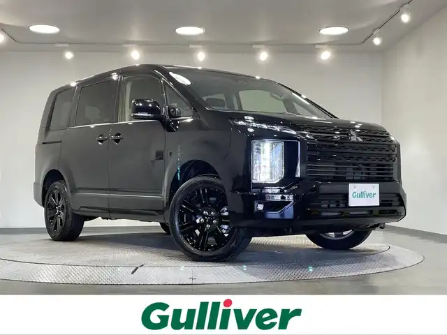 三菱 デリカＤ：５ ブラックエディション 愛知県 2025(令7)年 0.1千km アメジストブラック 登録済未使用車/電動サイドステップ/本革シート/純正１１インチナビ/フリップダウンモニター/両側パワースライドドア/パワーバックドア/レーダークルーズコントロール/衝突軽減ブレーキ/車線逸脱警報/ブラインドスポットモニター/電動パーキングブレーキ/ブレーキホールド/パドルシフト/ハンドルヒーター/シートヒーター/ＬＥＤヘッドライト/AC100V100Wコンセント/アクセサリーソケット/USB＆HDMI入力端子/ISOFIX/純正18インチアルミホイール