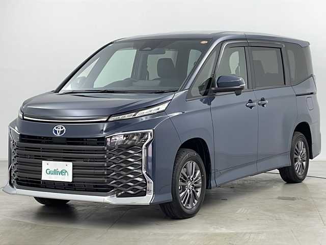 トヨタ ヴォクシー ハイブリッド S－G 道央・札幌 2025(令7)年 0.1万km マッシブグレー ・４ＷＤ/・純正ナビ＆ＴＶ＆ＢＴ＆ＤＶＤ＆ＣＤ/・バックカメラ/・レーダークルーズコントロール/・衝突被害軽減ブレーキ/・レーンキープアシスト/・両側電動スライドドア/・ＥＴＣ/・ステアリングスィッチ/・ＨＤＭＩ/・コーナーセンサー/・ＬＥＤヘッドライト