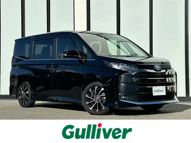 トヨタ ノア ハイブリッド S－Z 大阪府 2022(令4)年 2.4万km アティチュードブラックマイカ トヨタセーフティセンス/純正１０．５インチナビ　/・フルセグTV/USB/BT/HDMI/バックカメラ　/BSM　/両側パワースライドドア　/AC100V/ハーフレザーシート/シートヒーター　/ビルトインＥＴＣ２．０　/ロードサイドアシスト　/クリアランスソナー　/レーダークルーズコントロール/アイドリングストップ/LEDヘッド・フォグ　/純正フロアマット　/純正17インチAW/取説・保証書