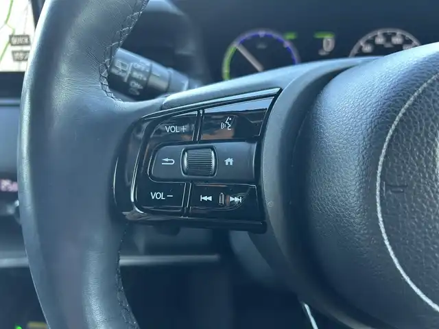 ホンダ ヴェゼル ハイブリッド e:HEV Z 福島県 2023(令5)年 1.2万km クリスタルブラックパール ホンダセンシング/衝突軽減ブレーキ/アダプティブクルーズコントロール/車線維持支援システム/誤発進抑制機能/後方誤発進抑制機能/路外逸脱抑制機能/先行車発進お知らせ機能/標識認識機能/オートハイビーム/ブラインドスポットインフォメーション/純正ナビゲーション/型番：VXU-225VZi/【CD/DVD/SD/USB/Bluetooth/TV】/バックカメラ/純正前後ドライブレコーダー/ビルトインETC/おくだけ充電/電動リフトゲート/前席シートヒーター/ステアリングヒーター/パドルシフト/ステアリングリモコン/LEDオートライト/LEDフォグランプ/純正フロアマット/ドアバイザー