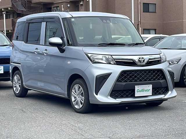 トヨタ ルーミー X 静岡県 2023(令5)年 0.7万km ブライトシルバーM 純正ナビ　/AM/FM/フルセグ/BT/片側パワースライドドア/ドライブレコーダー前後/衝突軽減ブレーキ/横滑り防止/パーキングアシスト/ステアリングスイッチ/純正タイヤ