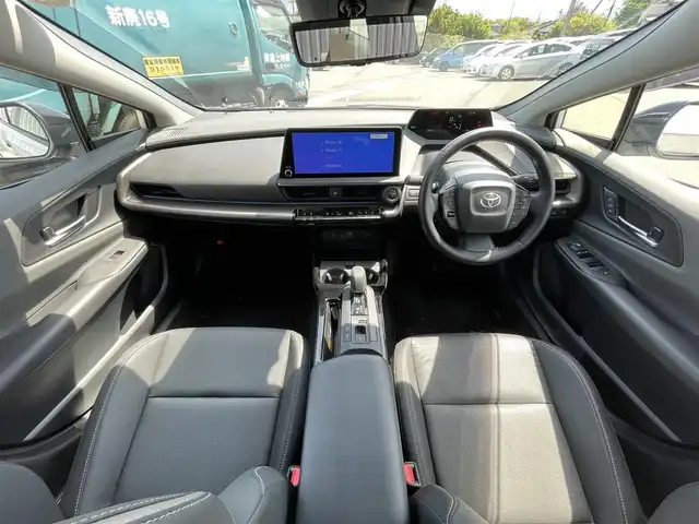 トヨタ プリウス Z 愛媛県 2024(令6)年 0.8万km プラチナホワイトパールマイカ 純正12.3インチディスプレイオーディオ/フルセグTV/Bluetooth　/全方位カメラ　/モデリスタエアロ/トヨタセーフティセンス/プリクラッシュセーフティ/レーダークルーズコントロール　/アドバンストパーク/緊急時操舵支援/車線逸脱防止装置/ブラインドスポットモニター/デジタルインナーミラー/D席シートメモリー機能/D/N席シートヒーター/シートベンチレーション　/ステアリングヒーター/パノラマルーフ　/電動トランクリッド　/純正ドライブレコーダー　/100Ｖ充電　/ワイヤレス充電　/ETC2.0/現状サマー(純正AW)(195/50/R19)/BRIDGESTONE ECOPIA