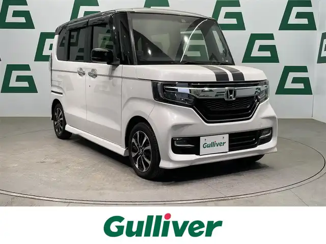 ホンダ Ｎ ＢＯＸ カスタム G L ホンダセンシング 鹿児島県 2020(令2)年 1.8万km パールⅡ 禁煙車/ホンダセンシング/純正ナビ/・CD/DVD/・フルセグTV/・BT/・USB/純正前後ドラレコ/片側パワスラ/ビルドインETC/社外レーダー探知機/純正フロアマット/純正アルミ/純正LEDヘッドライト/フロントフォグ/オートライト/オートマチックハイビーム/スマートキー/プッシュスタート