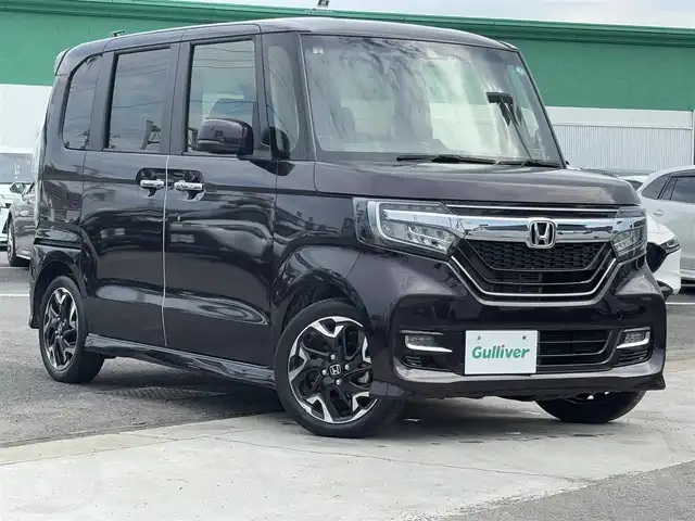 ホンダ Ｎ ＢＯＸ カスタム G L ターボ ホンダセンシング 徳島県 2020(令2)年 1.2万km プレミアムベルベットパープル・パール 純正ギャザーズナビ VXM-204VFi/(AM.FM.CD.DVD.BT.フルセグ.SD)/純正前後ドライブレコーダー/ホンダセンシング/・アダプティブ・クルーズ・コントロール（ACC）/・車線維持支援システム（LKAS）/・衝突軽減ブレーキ（CMBS）/・誤発進抑制機能（前進）/・歩行者事故低減ステアリング/・路外逸脱抑制機能/・先行車発進お知らせ機能/・標識認識機能/・オートハイビーム/・誤発進抑制機能（後進）/両側パワースライドドア/バックカメラ/黒革ハーフレザーシート/パドルシフト/ＬＥＤヘッドライト/ビルトインＥＴＣ/純正アルミホイール/ＵＳＢ充電２口