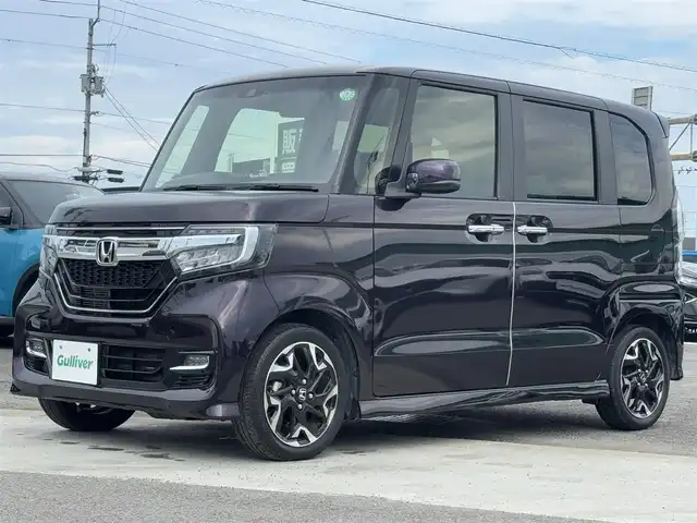 ホンダ Ｎ ＢＯＸ カスタム G L ターボ ホンダセンシング 徳島県 2020(令2)年 1.2万km プレミアムベルベットパープル・パール 純正ギャザーズナビ VXM-204VFi/(AM.FM.CD.DVD.BT.フルセグ.SD)/純正前後ドライブレコーダー/ホンダセンシング/・アダプティブ・クルーズ・コントロール（ACC）/・車線維持支援システム（LKAS）/・衝突軽減ブレーキ（CMBS）/・誤発進抑制機能（前進）/・歩行者事故低減ステアリング/・路外逸脱抑制機能/・先行車発進お知らせ機能/・標識認識機能/・オートハイビーム/・誤発進抑制機能（後進）/両側パワースライドドア/バックカメラ/黒革ハーフレザーシート/パドルシフト/ＬＥＤヘッドライト/ビルトインＥＴＣ/純正アルミホイール/ＵＳＢ充電２口