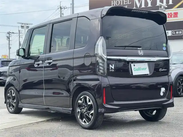 ホンダ Ｎ ＢＯＸ カスタム G L ターボ ホンダセンシング 徳島県 2020(令2)年 1.2万km プレミアムベルベットパープル・パール 純正ギャザーズナビ VXM-204VFi/(AM.FM.CD.DVD.BT.フルセグ.SD)/純正前後ドライブレコーダー/ホンダセンシング/・アダプティブ・クルーズ・コントロール（ACC）/・車線維持支援システム（LKAS）/・衝突軽減ブレーキ（CMBS）/・誤発進抑制機能（前進）/・歩行者事故低減ステアリング/・路外逸脱抑制機能/・先行車発進お知らせ機能/・標識認識機能/・オートハイビーム/・誤発進抑制機能（後進）/両側パワースライドドア/バックカメラ/黒革ハーフレザーシート/パドルシフト/ＬＥＤヘッドライト/ビルトインＥＴＣ/純正アルミホイール/ＵＳＢ充電２口