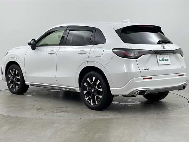 ホンダ ＺＲ－Ｖ ハイブリッド e:HEV Z 道央・札幌 2024(令6)年 1.9万km プラチナホワイトパール ・4WD/・寒冷地仕様/・純正ナビ&BT&TV&Apple Car Play&Android Auto/・BOSEプレミアムサウンド/・全方位カメラ/・パワーテールゲート/・Honda　SENSING/・本革シート/・前席パワーシート/・運転席シートメモリ/・全席シートヒーター/・ステアリングヒーター/・ワイヤレス充電/・ビルトインETC/・ドアミラーヒーター/・LEDヘッドライト/・アダプティブドライビングビーム/・オートライト/・スマートキー/・純正18インチAW