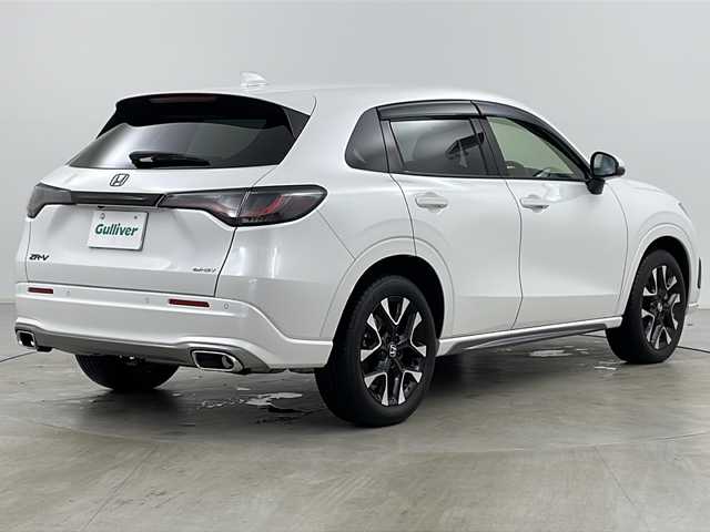ホンダ ＺＲ－Ｖ ハイブリッド e:HEV Z 道央・札幌 2024(令6)年 1.9万km プラチナホワイトパール ・4WD/・寒冷地仕様/・純正ナビ&BT&TV&Apple Car Play&Android Auto/・BOSEプレミアムサウンド/・全方位カメラ/・パワーテールゲート/・Honda　SENSING/・本革シート/・前席パワーシート/・運転席シートメモリ/・全席シートヒーター/・ステアリングヒーター/・ワイヤレス充電/・ビルトインETC/・ドアミラーヒーター/・LEDヘッドライト/・アダプティブドライビングビーム/・オートライト/・スマートキー/・純正18インチAW