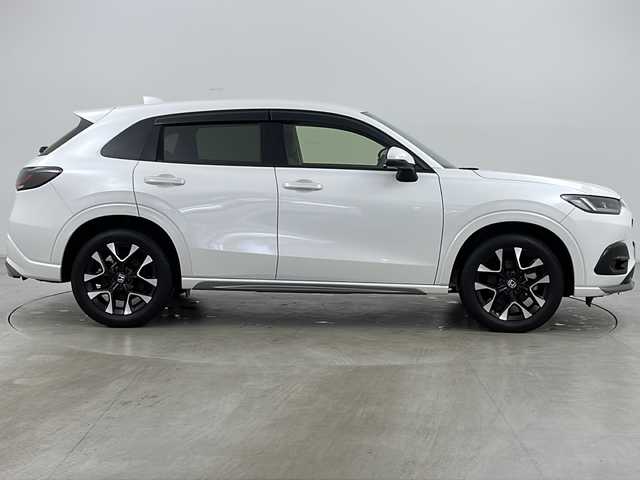 ホンダ ＺＲ－Ｖ ハイブリッド e:HEV Z 道央・札幌 2024(令6)年 1.9万km プラチナホワイトパール ・4WD/・寒冷地仕様/・純正ナビ&BT&TV&Apple Car Play&Android Auto/・BOSEプレミアムサウンド/・全方位カメラ/・パワーテールゲート/・Honda　SENSING/・本革シート/・前席パワーシート/・運転席シートメモリ/・全席シートヒーター/・ステアリングヒーター/・ワイヤレス充電/・ビルトインETC/・ドアミラーヒーター/・LEDヘッドライト/・アダプティブドライビングビーム/・オートライト/・スマートキー/・純正18インチAW