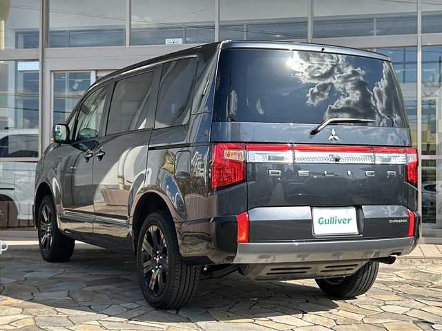 三菱 デリカＤ：５ シャモニー 静岡県 2025(令7)年 0.1千km グラファイトグレーメタリック/ブラックマイカ 社外ナビ（BOUWOIMAナビ　10インチ）/　Bluetooth/ラジオ/主要装備/・アダプティクブクルーズコントロール/・レーンキープアシスト/・プリクラッシュセーフティー/・全方位カメラ/・両側パワースライドドア/・BSM/・シートヒーター/・パドルシフト/・アラウンドビューモニター（ミラー型）/・アイドリングストップ/・ステアリングヒーター/・ステアリングリモコン/・オートホールド/・オートハイビーム/・LEDヘッドライト